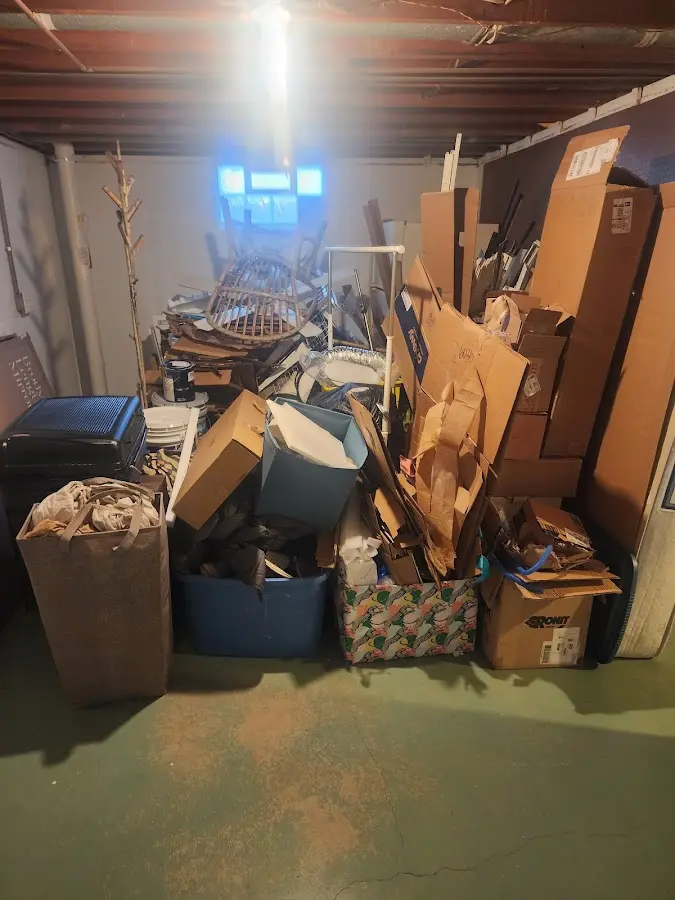 Roll-off dumpster container at job site for 2 Yard Dumpster Rental in International Falls